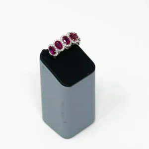 Oval Ruby With Diamond Halo in White Gold